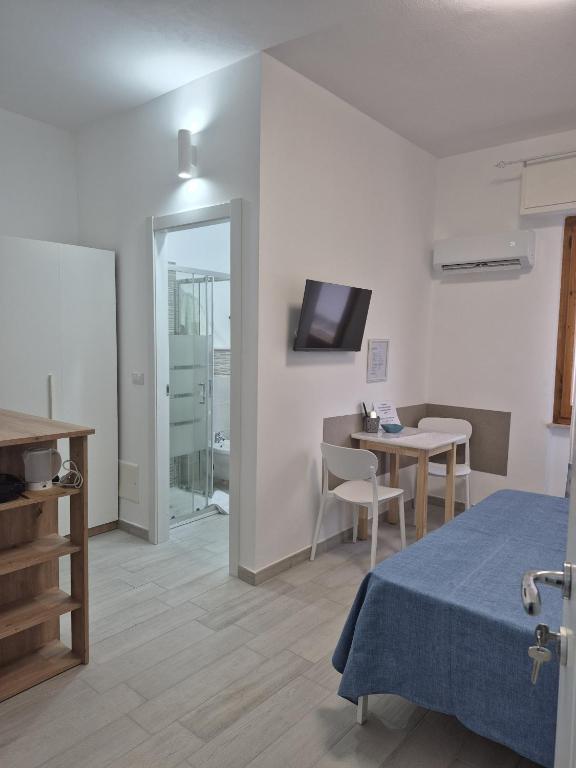 TV a/nebo společenská místnost v ubytování Beach Rooms 2 Self Check-in