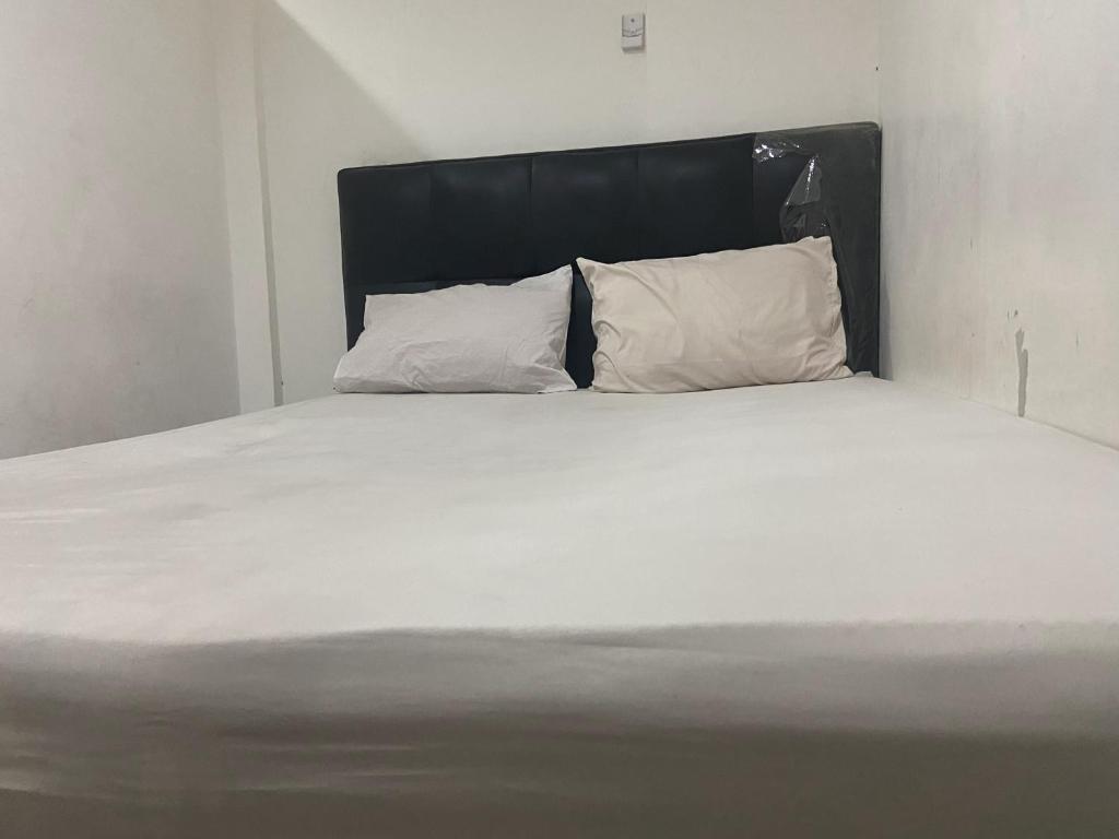 Hotel O Penginapan Fajar Syariah - Budget Tweepersoonskamer