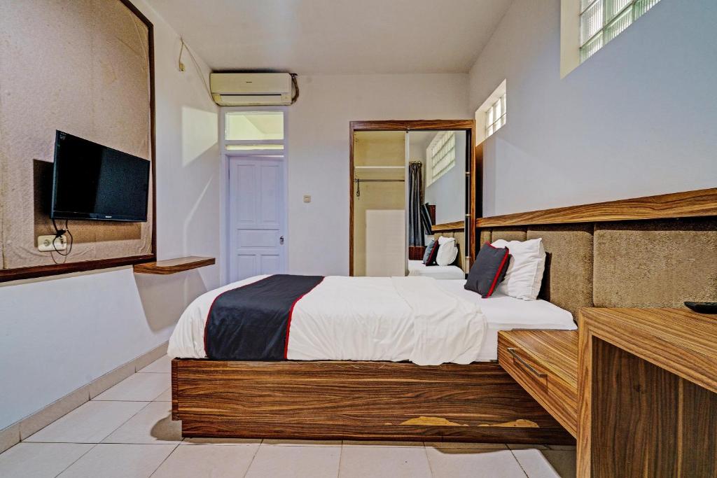 TV a/nebo společenská místnost v ubytování SUPER OYO Collection O 92277 Setra Priangan Guest House