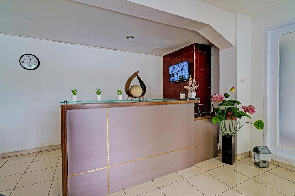 TV a/nebo společenská místnost v ubytování SUPER OYO Collection O 92277 Setra Priangan Guest House