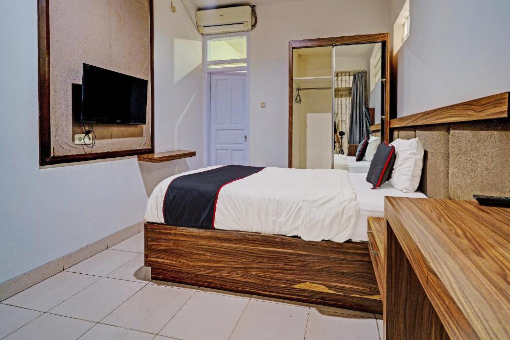 TV a/nebo společenská místnost v ubytování SUPER OYO Collection O 92277 Setra Priangan Guest House