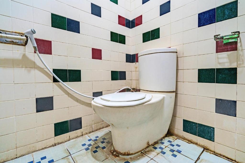 Koupelna v ubytování Super OYO Capital O 91810 Hotel Balebat 2
