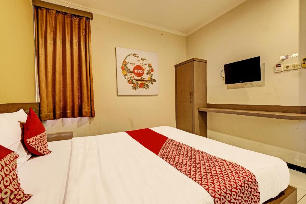 Postel nebo postele na pokoji v ubytování Sky Guesthouse