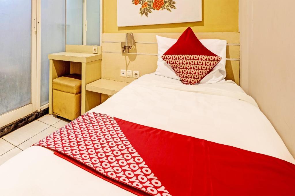 Postel nebo postele na pokoji v ubytování Sky Guesthouse