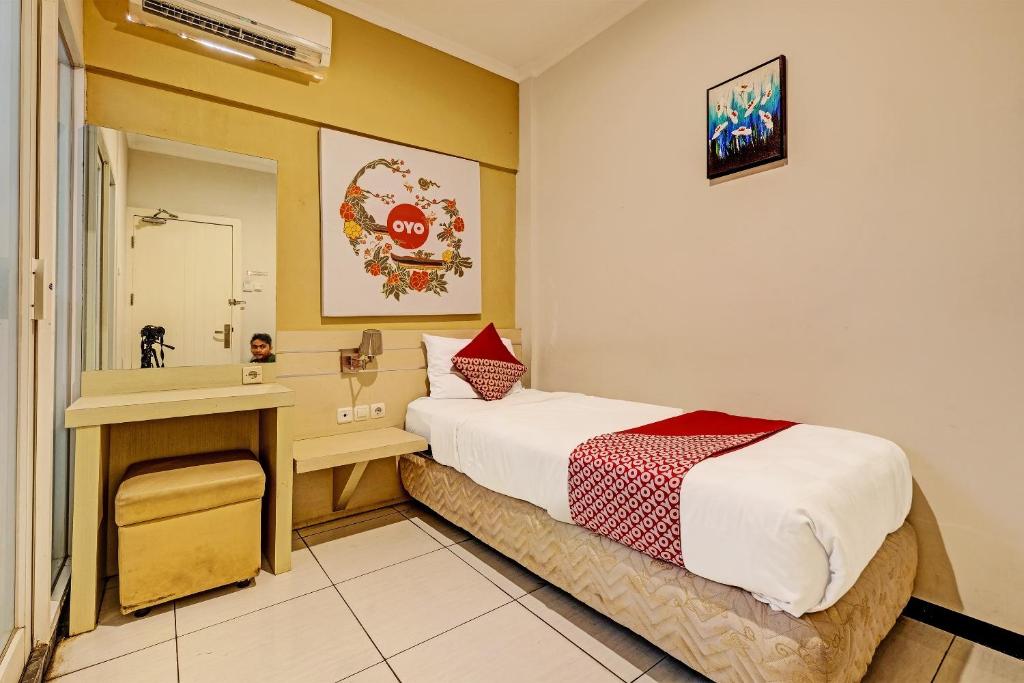 Postel nebo postele na pokoji v ubytování Sky Guesthouse