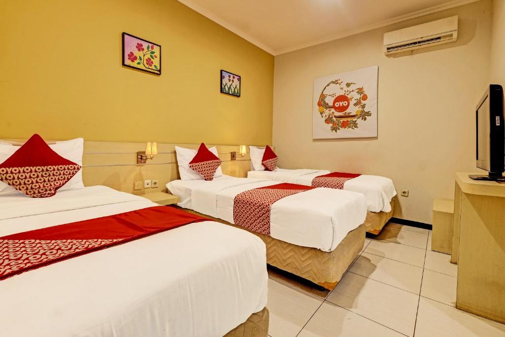 Postel nebo postele na pokoji v ubytování Sky Guesthouse