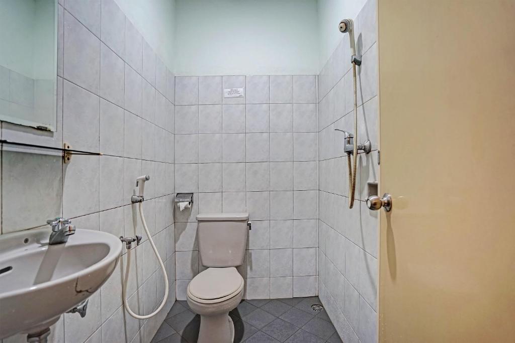 Koupelna v ubytování SUPER OYO 91805 Hotel Wisma Bari