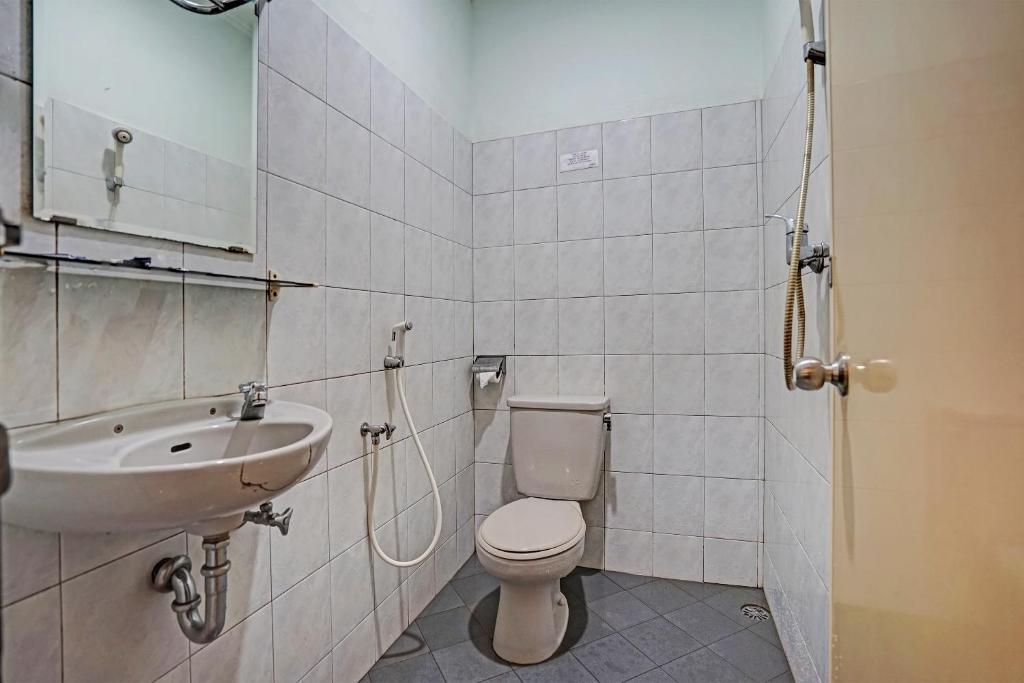Koupelna v ubytování SUPER OYO 91805 Hotel Wisma Bari