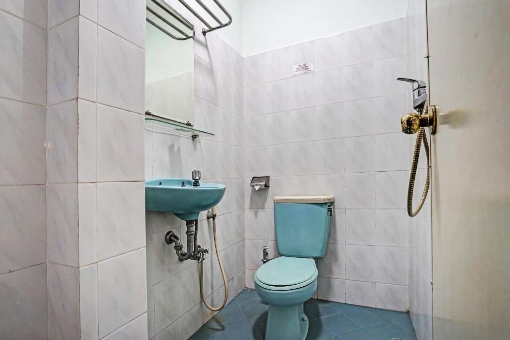 Koupelna v ubytování SUPER OYO 91805 Hotel Wisma Bari