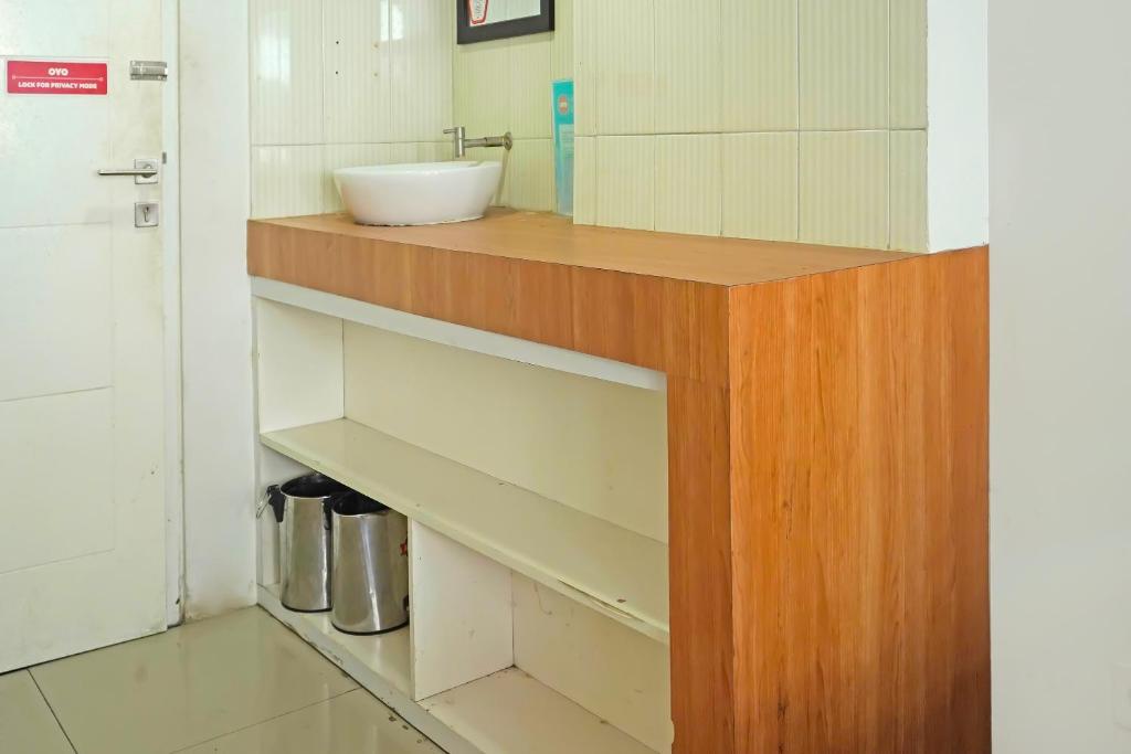 Kuchyň nebo kuchyňský kout v ubytování OYO 90391 Gkitroom