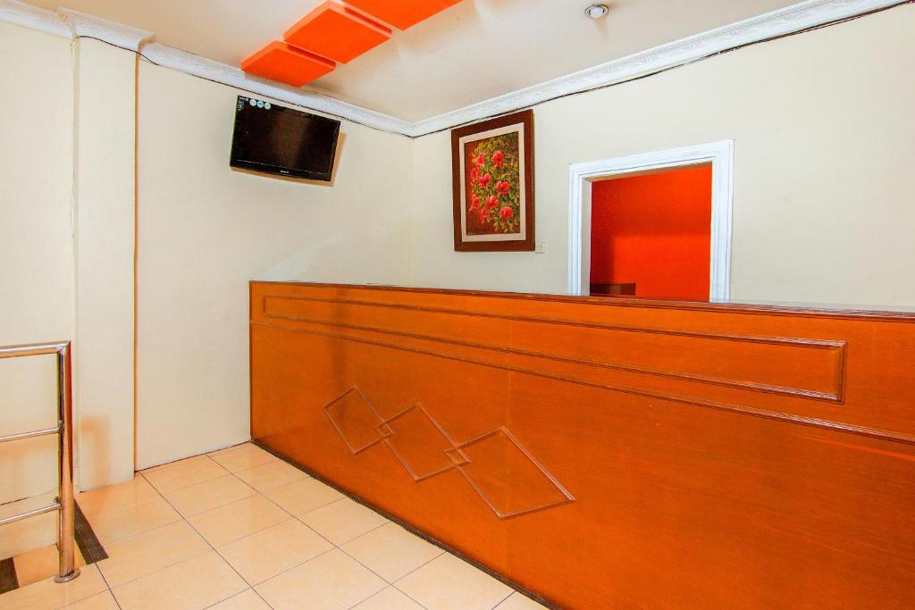 TV a/nebo společenská místnost v ubytování OYO 2045 Hotel 211