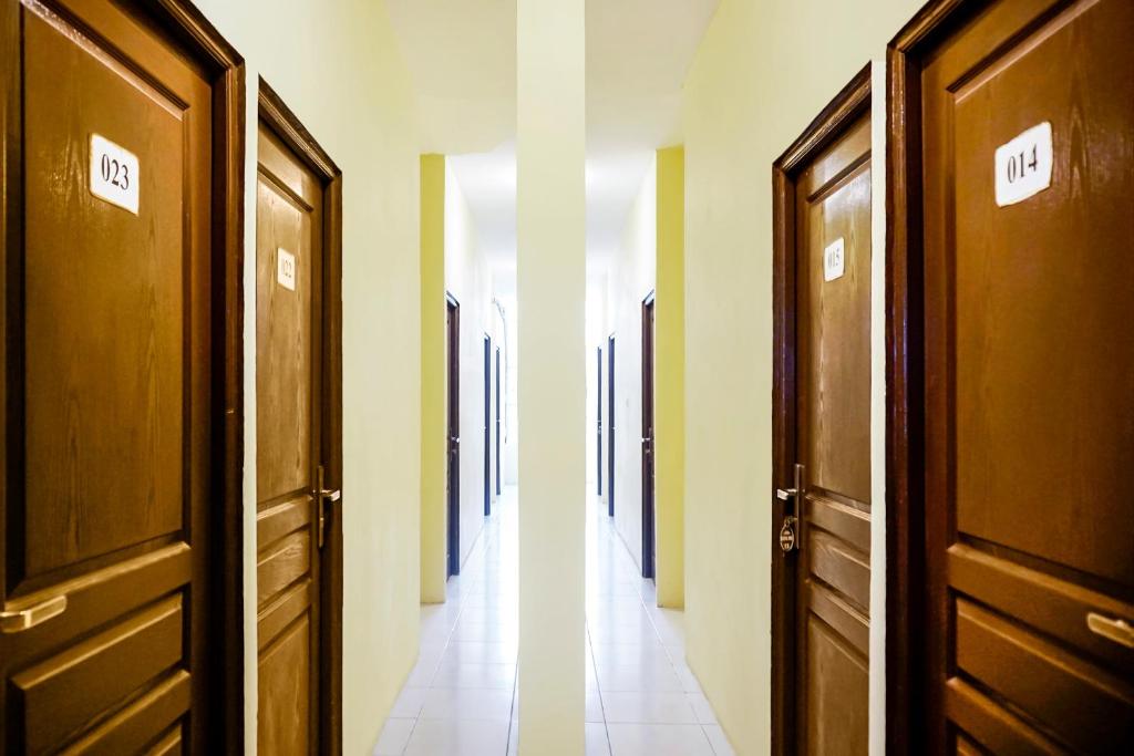 Fotografie z fotogalerie ubytování OYO 1192 Lotus Inn v destinaci Pekanbaru