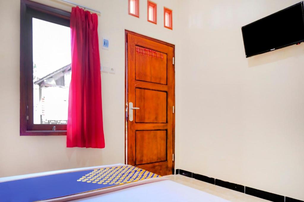 Fotografie z fotogalerie ubytování OYO 2826 Panderman Residence v destinaci Blitar