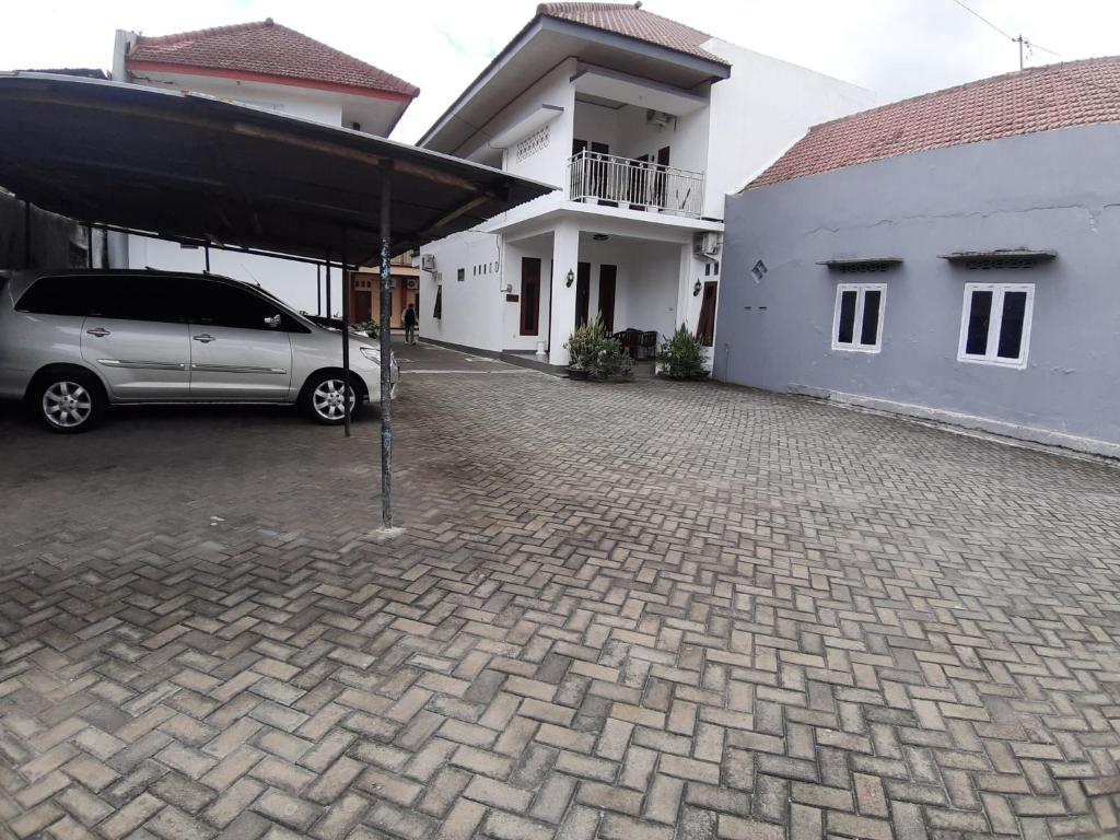 Fotografie z fotogalerie ubytování OYO 2826 Panderman Residence v destinaci Blitar