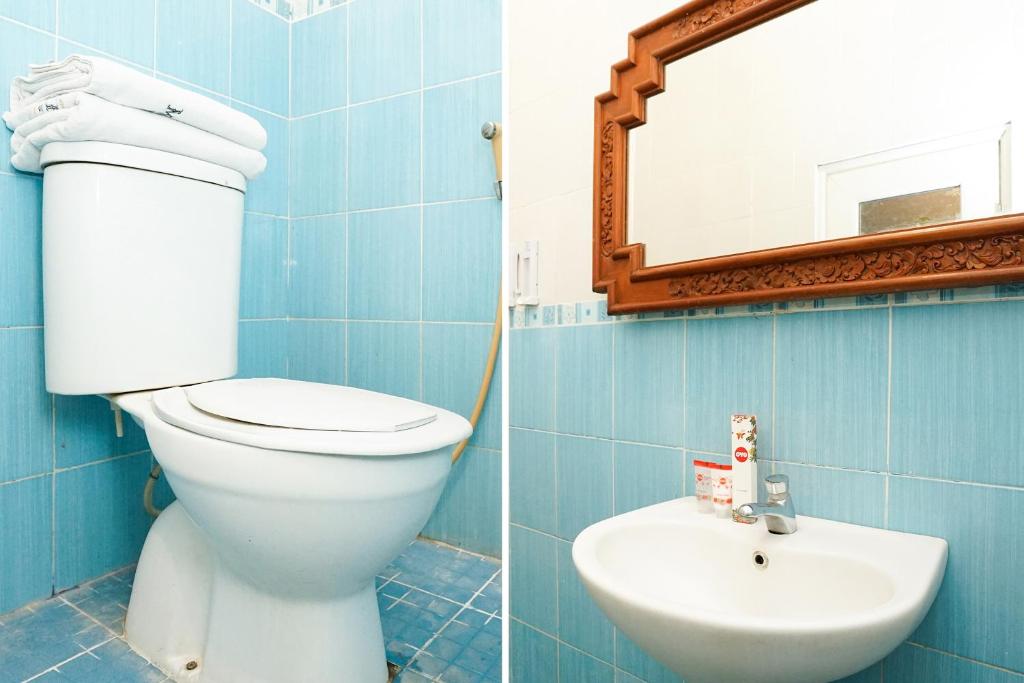 Koupelna v ubytování OYO 425 Mojokerto Guesthouse