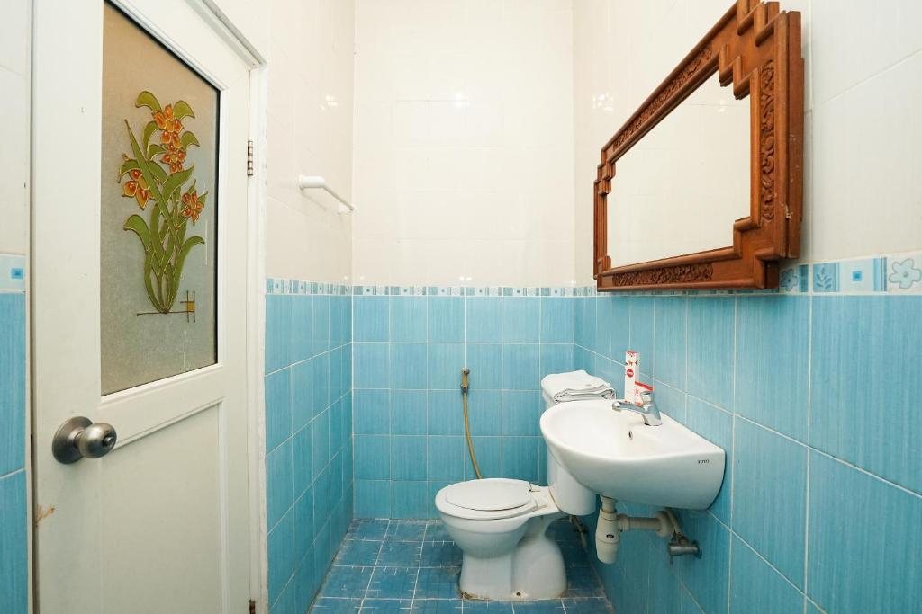 Koupelna v ubytování OYO 425 Mojokerto Guesthouse