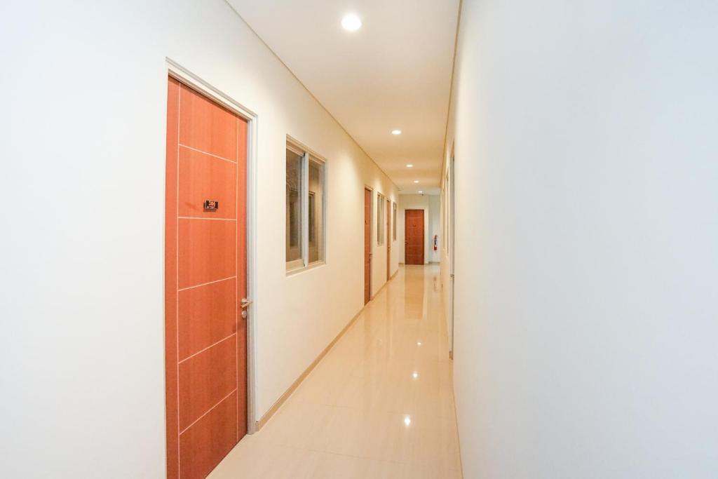 Fotografie z fotogalerie ubytování Super OYO Capital O 614 Graha 8 Syariah v destinaci Surabaja