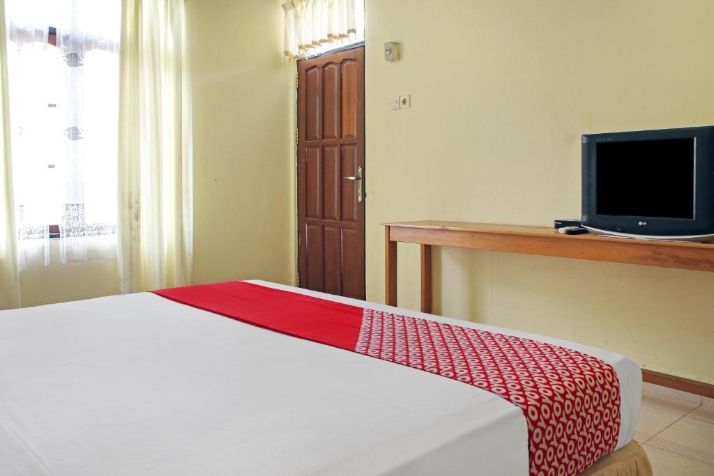 TV a/nebo společenská místnost v ubytování OYO 90423 Hotel Aman