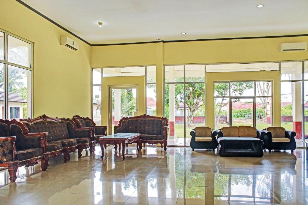 Posezení v ubytování OYO 90423 Hotel Aman