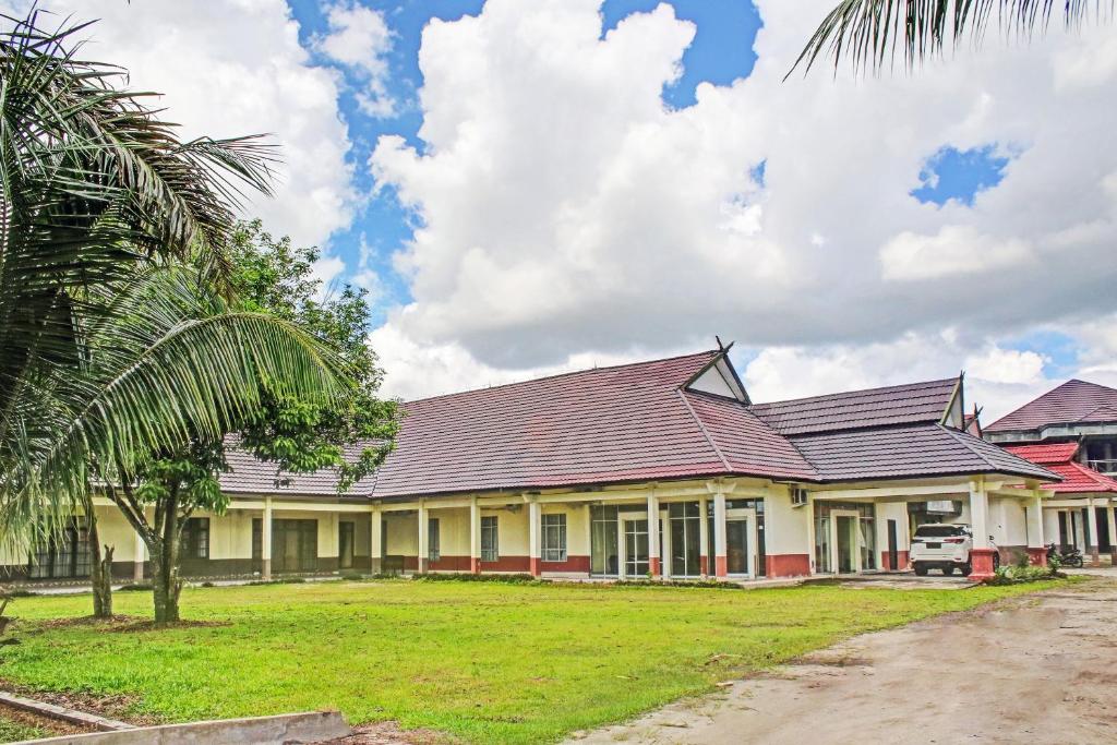 Zahrada ubytování OYO 90423 Hotel Aman