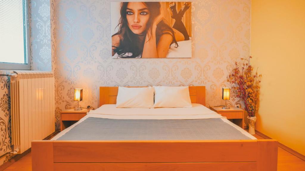 Postel nebo postele na pokoji v ubytování Guest House MK Star