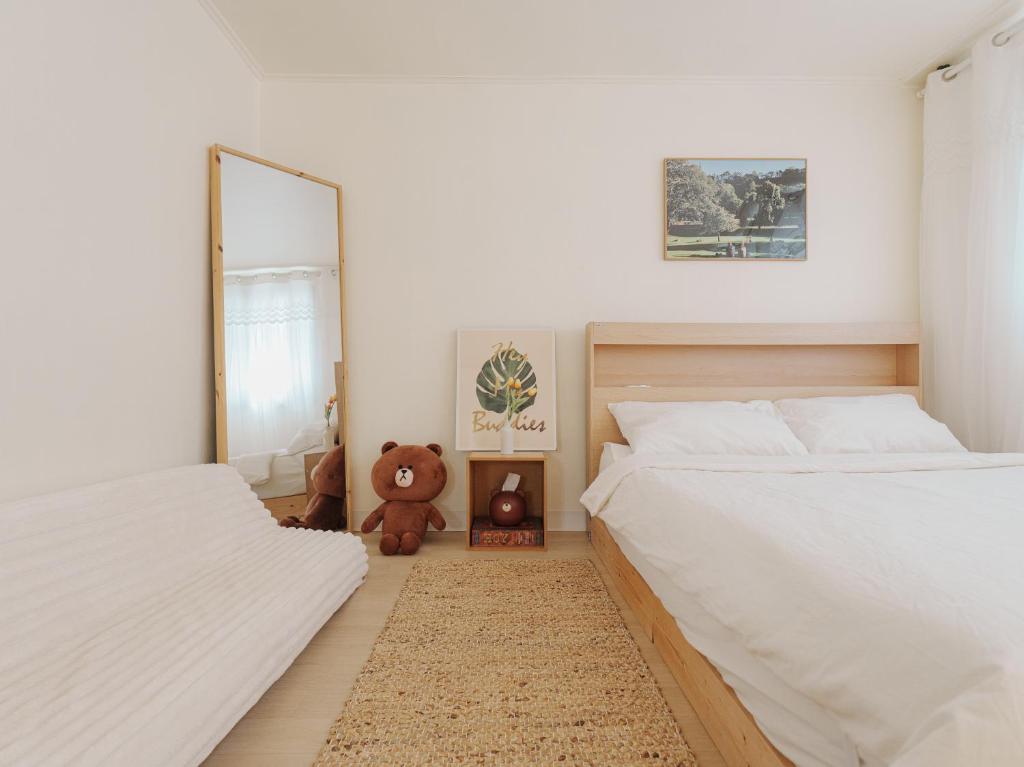 En eller flere senge i et værelse på Comfort Seoul