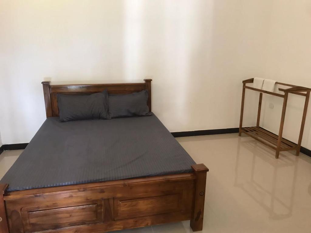 Postel nebo postele na pokoji v ubytování Royal Hotel
