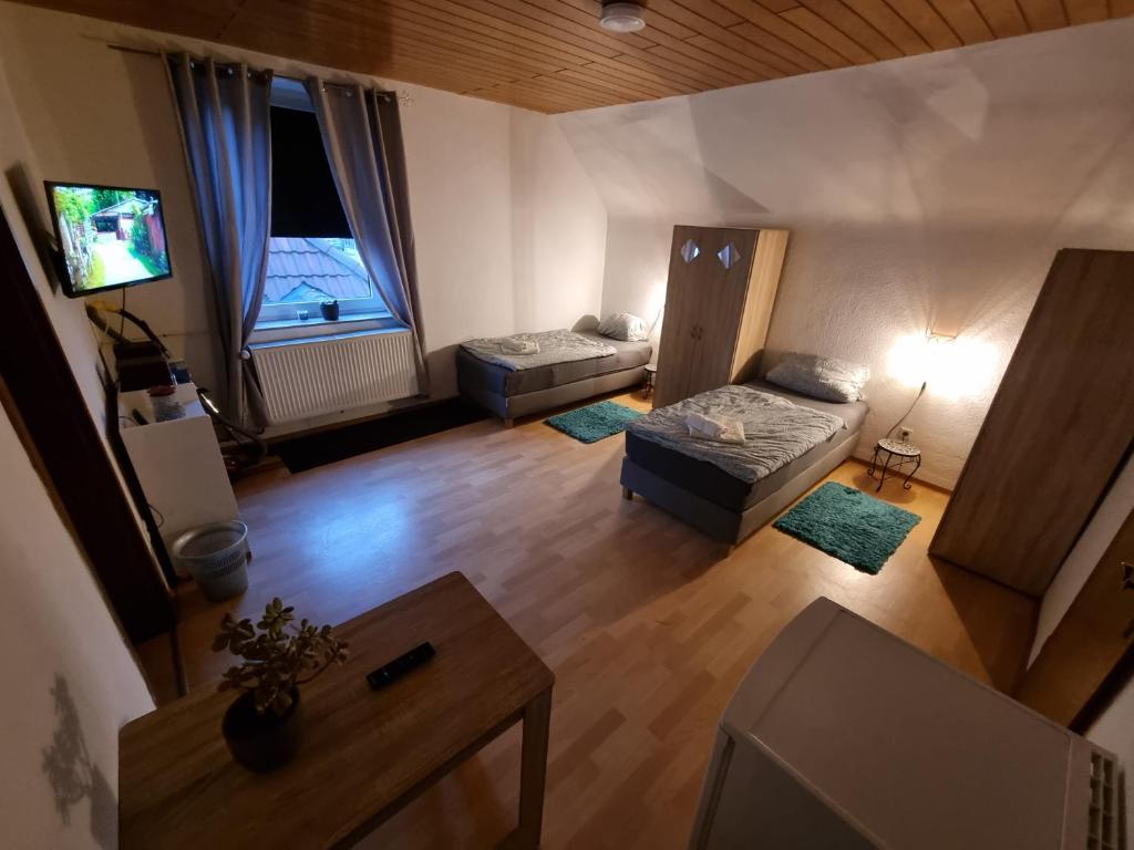 TV a/nebo společenská místnost v ubytování Haus Ruhrpott