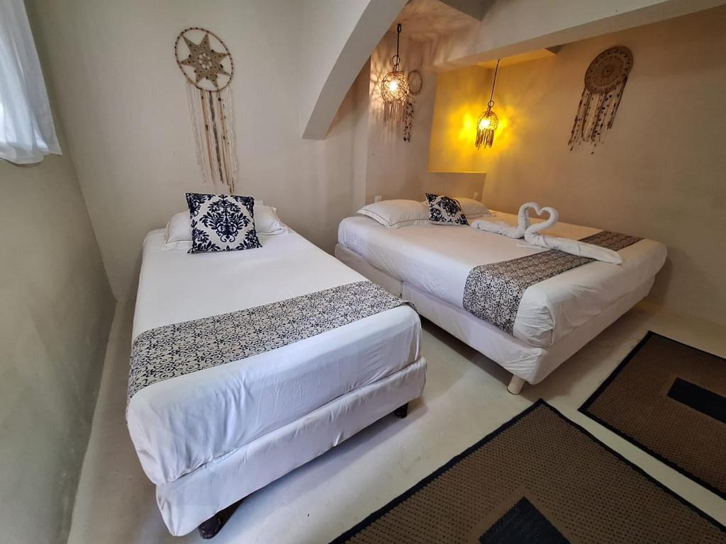 Postel nebo postele na pokoji v ubytování Nature Stay