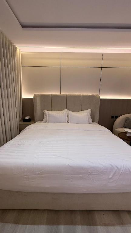 Postel nebo postele na pokoji v ubytování Private Studio Smart Entry Hotel System