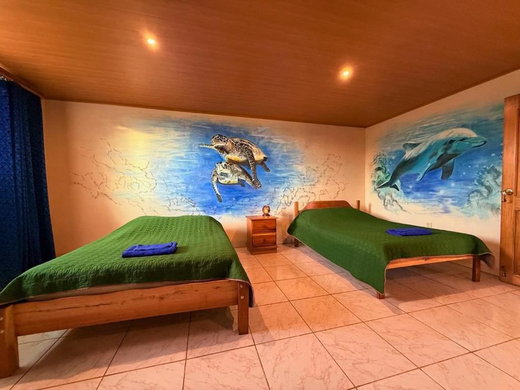 Postel nebo postele na pokoji v ubytování La Tigra Mountain House