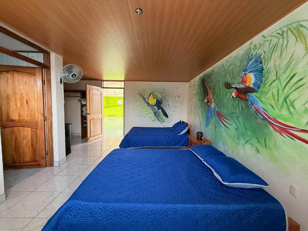 Postel nebo postele na pokoji v ubytování La Tigra Mountain House