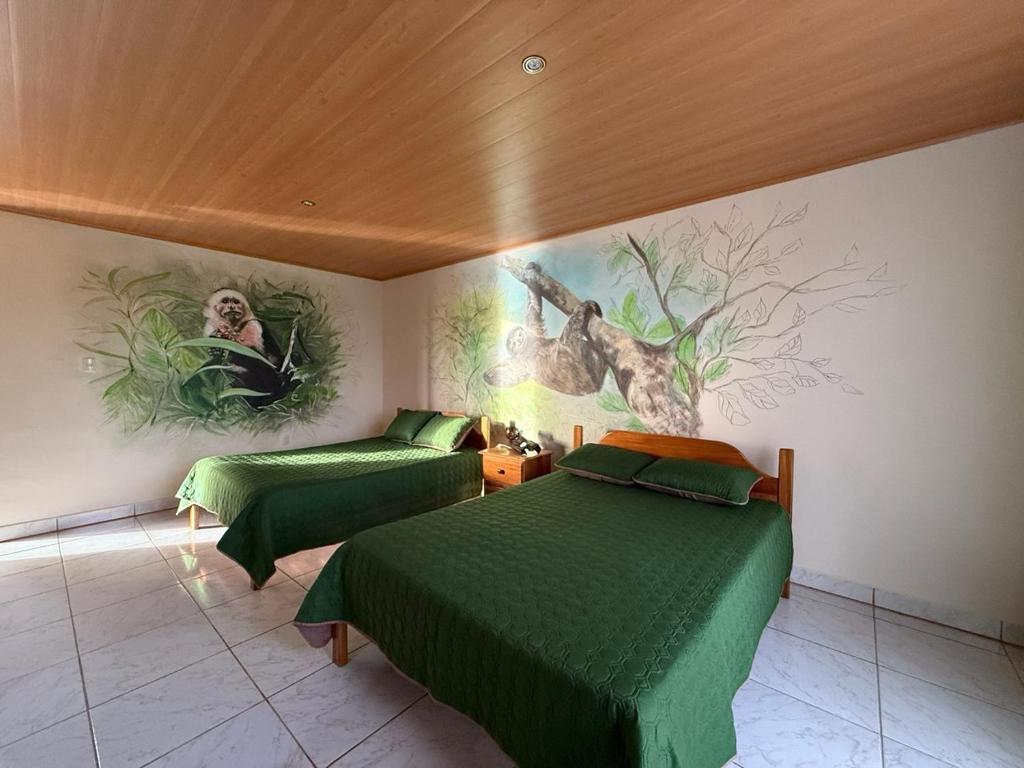 Postel nebo postele na pokoji v ubytování La Tigra Mountain House