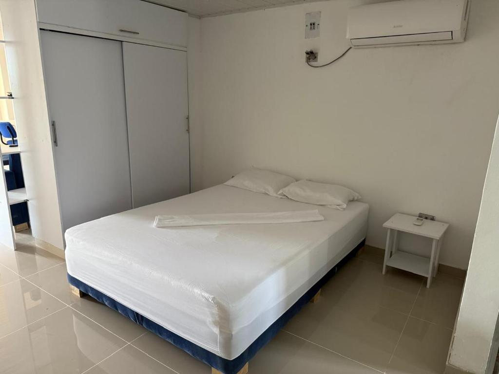 Postel nebo postele na pokoji v ubytování Club House