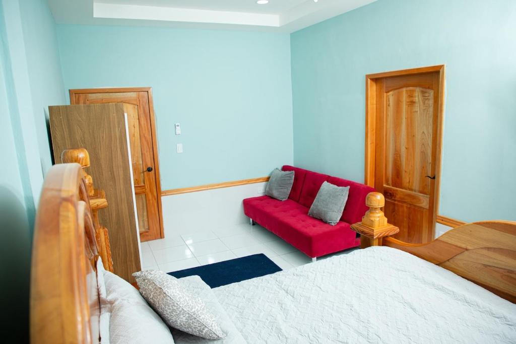 Postel nebo postele na pokoji v ubytování Rosalini's Villa