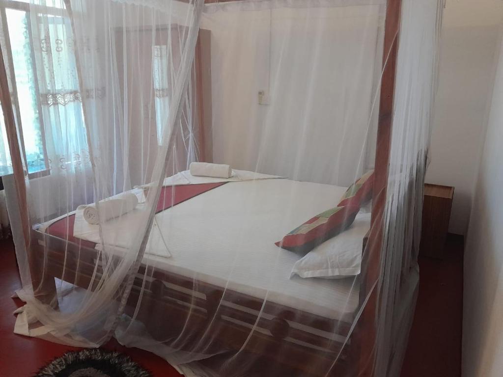 Postel nebo postele na pokoji v ubytování A 50 Arugambay