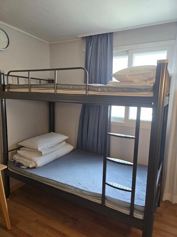 Postel nebo postele na pokoji v ubytování Appletree Hotel Pohang