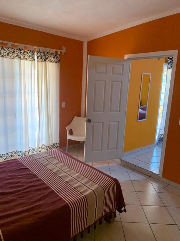 Postel nebo postele na pokoji v ubytování Posada la Natividad