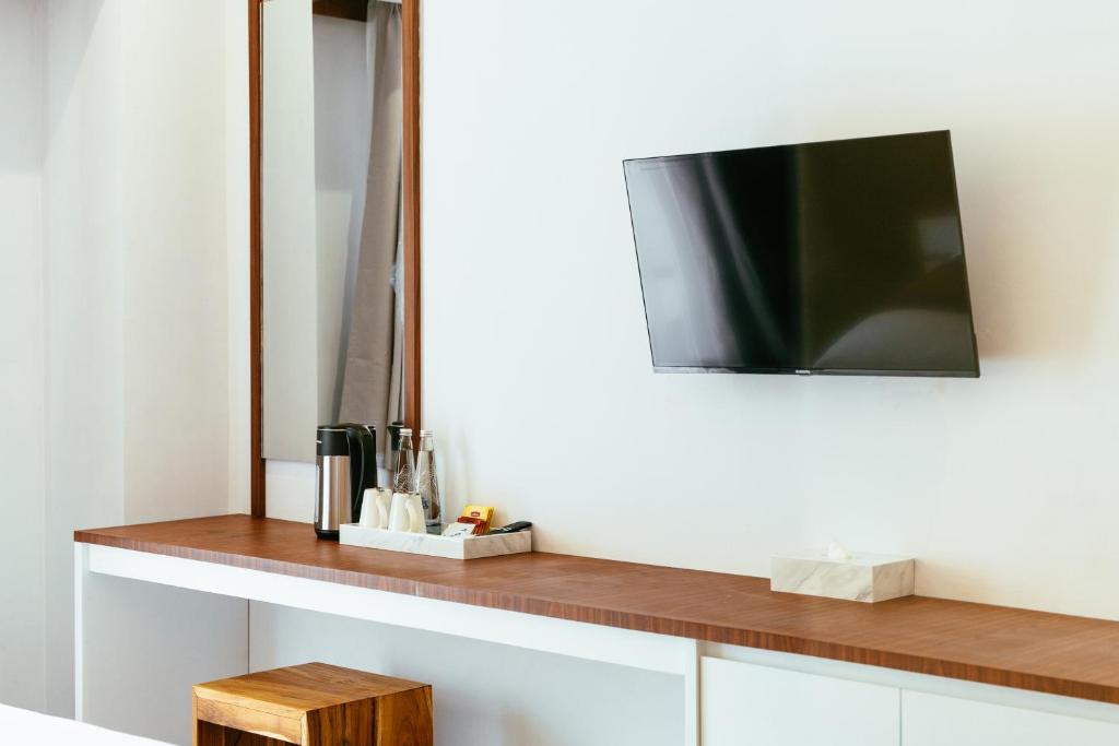 TV a/nebo společenská místnost v ubytování Nadi Hotel Legian