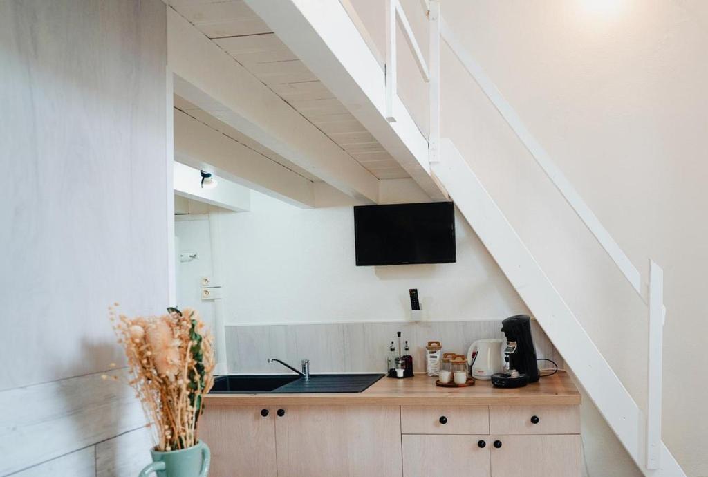 Kuchyň nebo kuchyňský kout v ubytování Logement en rez-de-chaussée