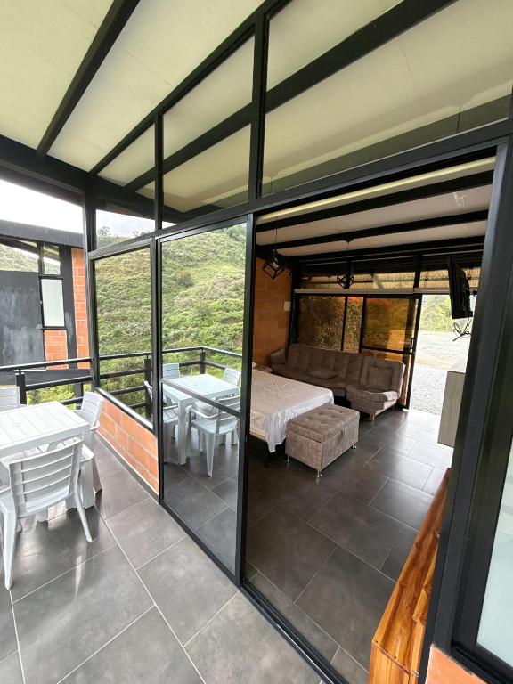 Postel nebo postele na pokoji v ubytování Suites del Lago