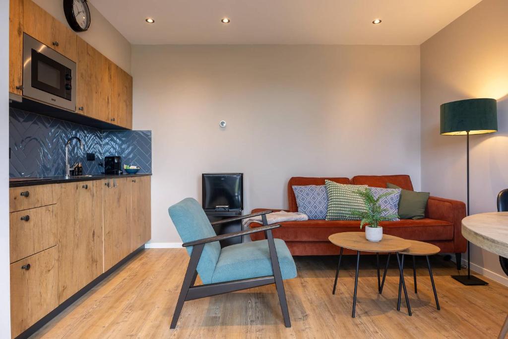 Kuchyň nebo kuchyňský kout v ubytování Hello Zeeland - Vakantiewoning Middelburgseweg 4