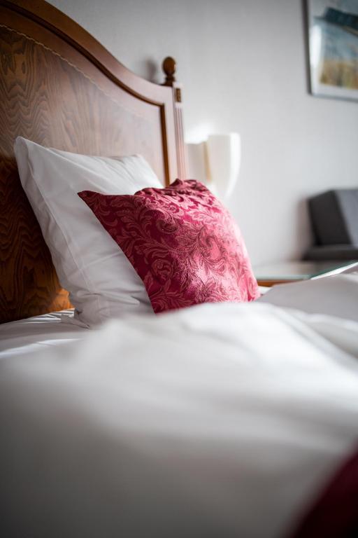 Postel nebo postele na pokoji v ubytování Hotel Marina