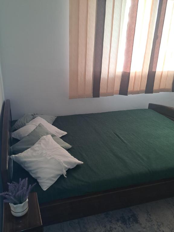 Postel nebo postele na pokoji v ubytování Apartament Borsec