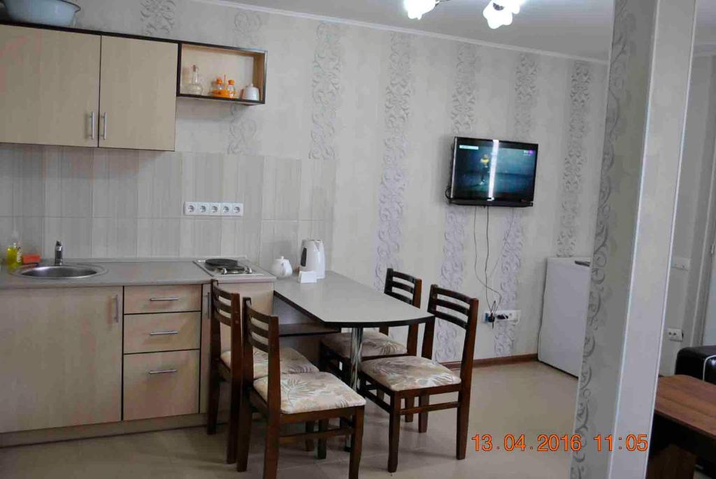 Kuchyň nebo kuchyňský kout v ubytování Dome Hotel
