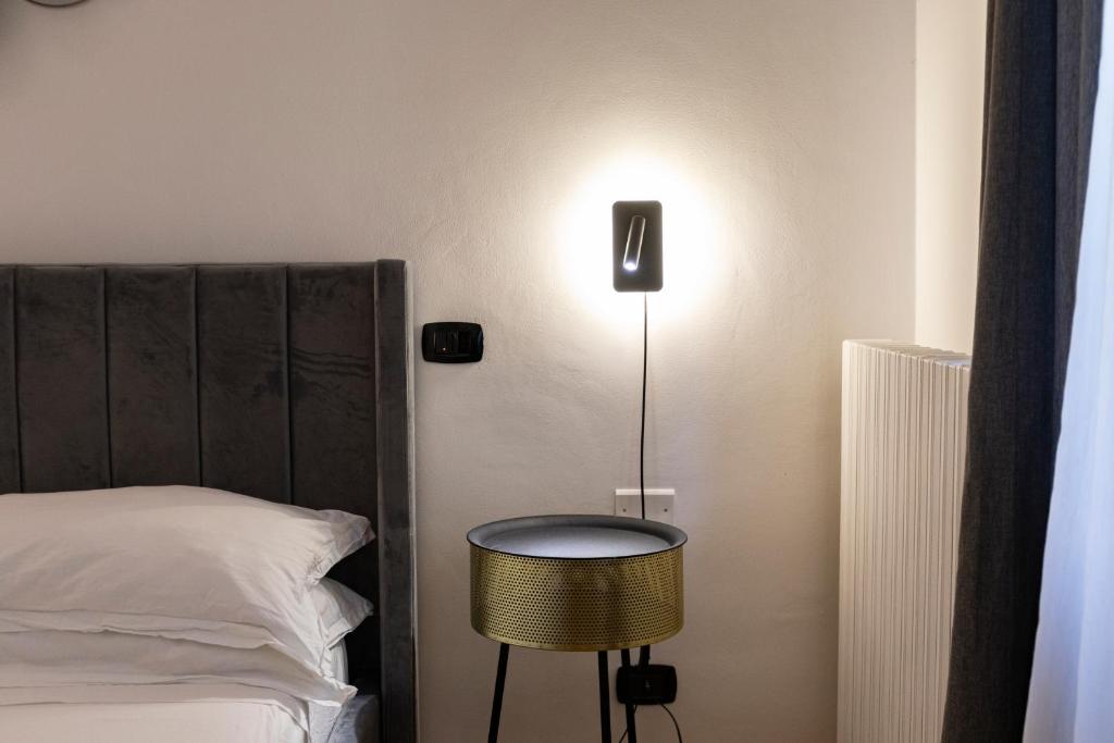 A bed or beds in a room at Dimora San Bartolomeo
