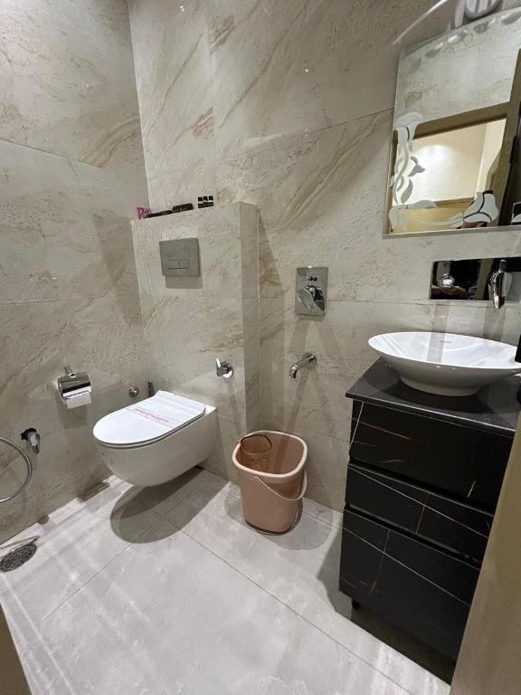 Koupelna v ubytování Divine Hotel