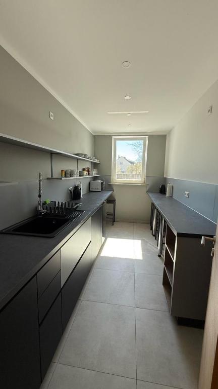 Kuchyň nebo kuchyňský kout v ubytování Hostel54