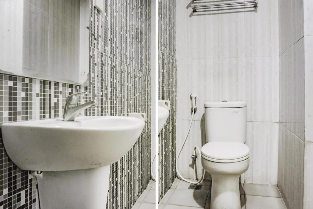 Koupelna v ubytování Collection O Hotel Antara