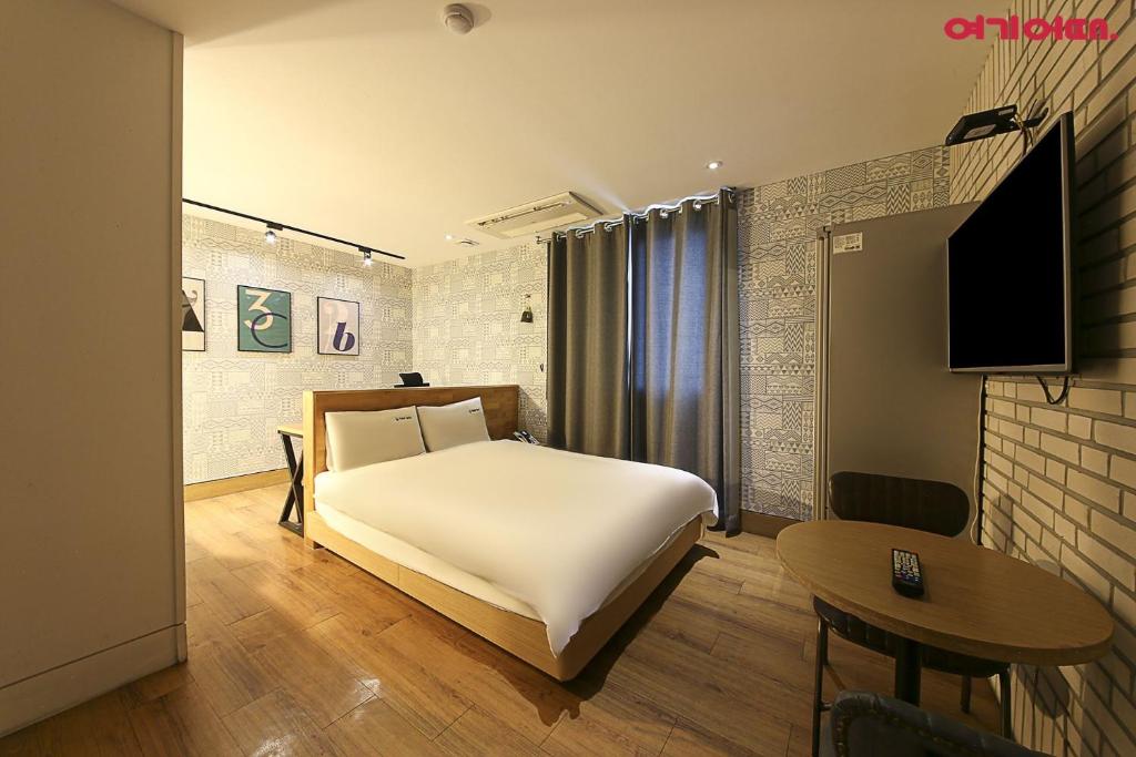 TV a/nebo společenská místnost v ubytování Ignis Hotel